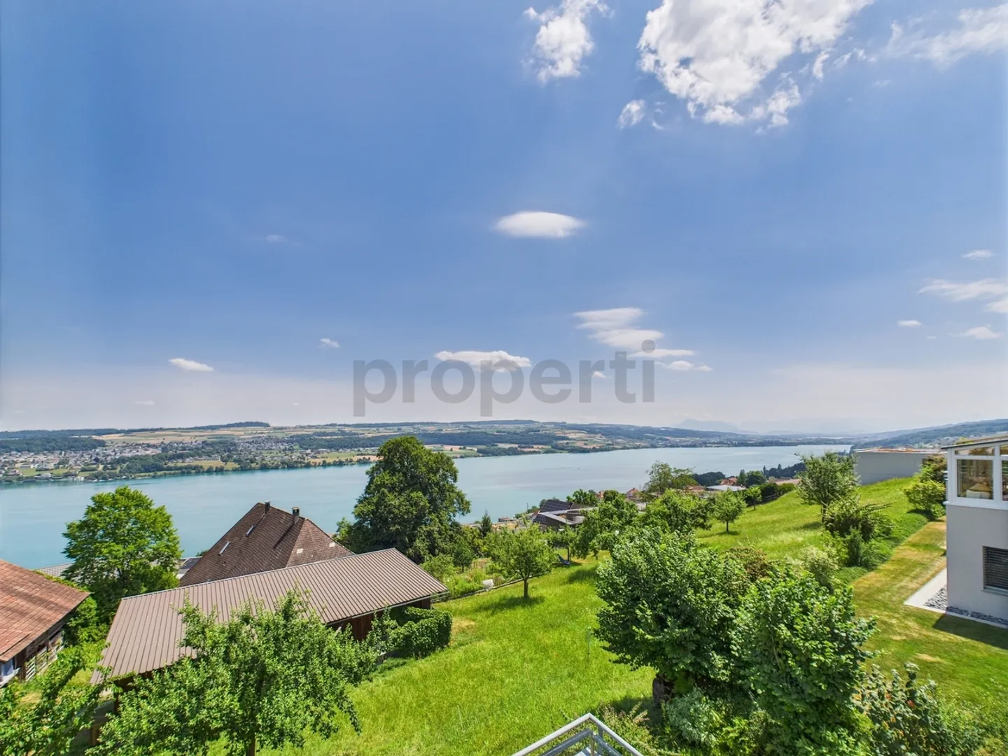 Living where others vacation. Dreamy 5.5 room penthouse apartment in Birrwil for sale with stunning views of the lake and mountains! - Photo 7 of 10