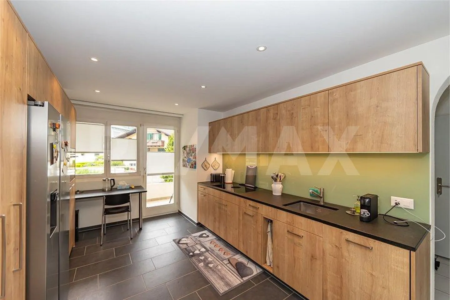 Bright, well-maintained 4.5-room apartment with 2 balconies, modern amenities... - Photo 4 of 13