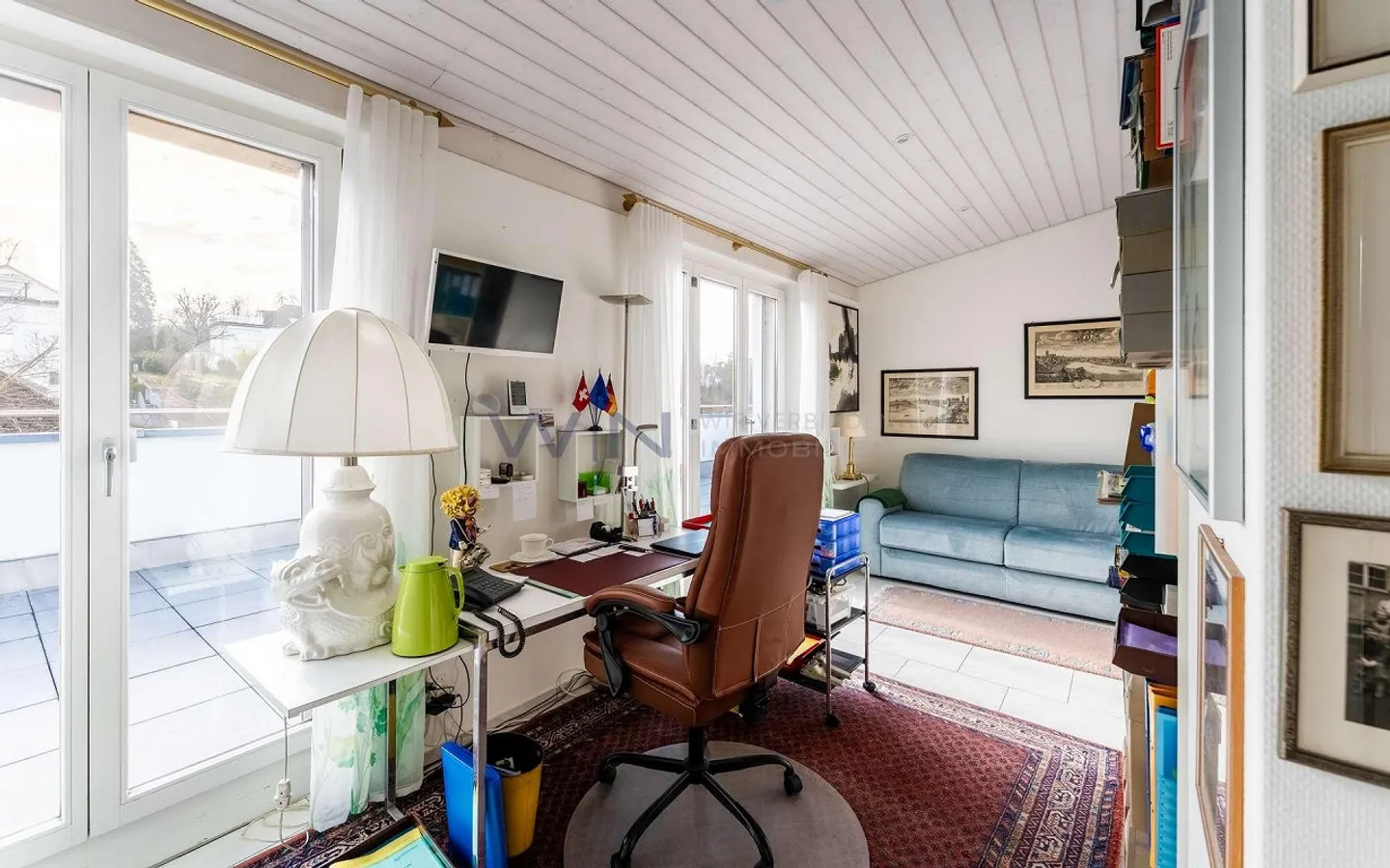 Une maison au-dessus des toits de la ville - Photo 9 sur 13