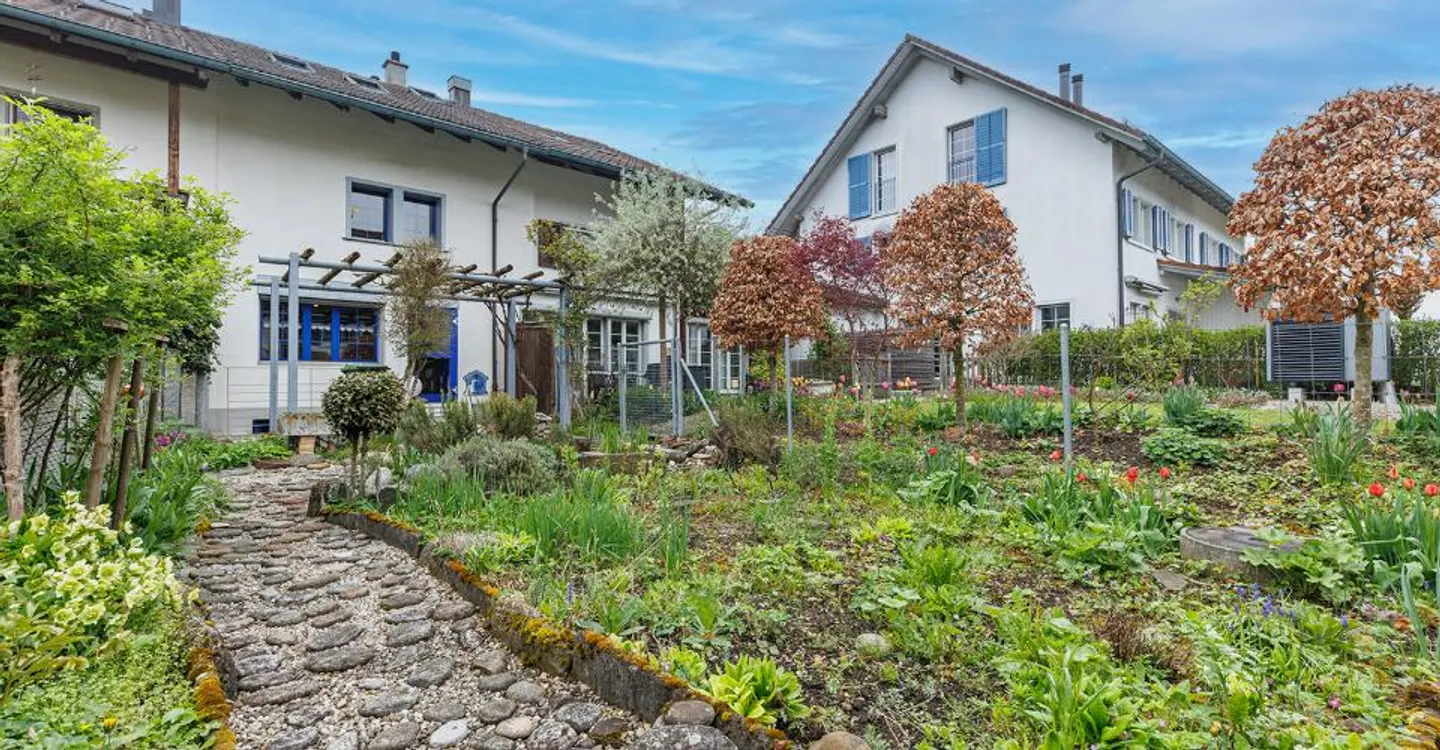 Familienfreundliches Haus mit Garten - Foto 1 von 8
