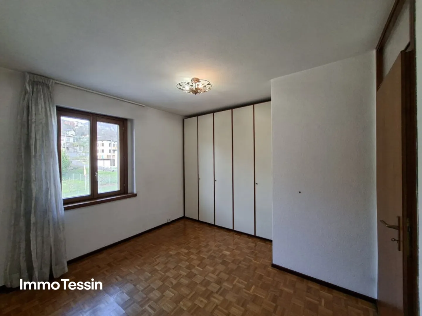 Geräumige Attikawohnung mit Garten - Foto 11 von 13