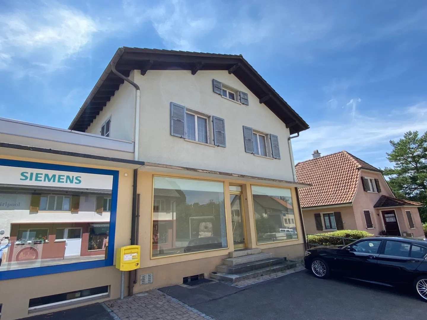Gebäude mit 2 Wohnungen und einer Gewerbefläche - Foto 30 von 34
