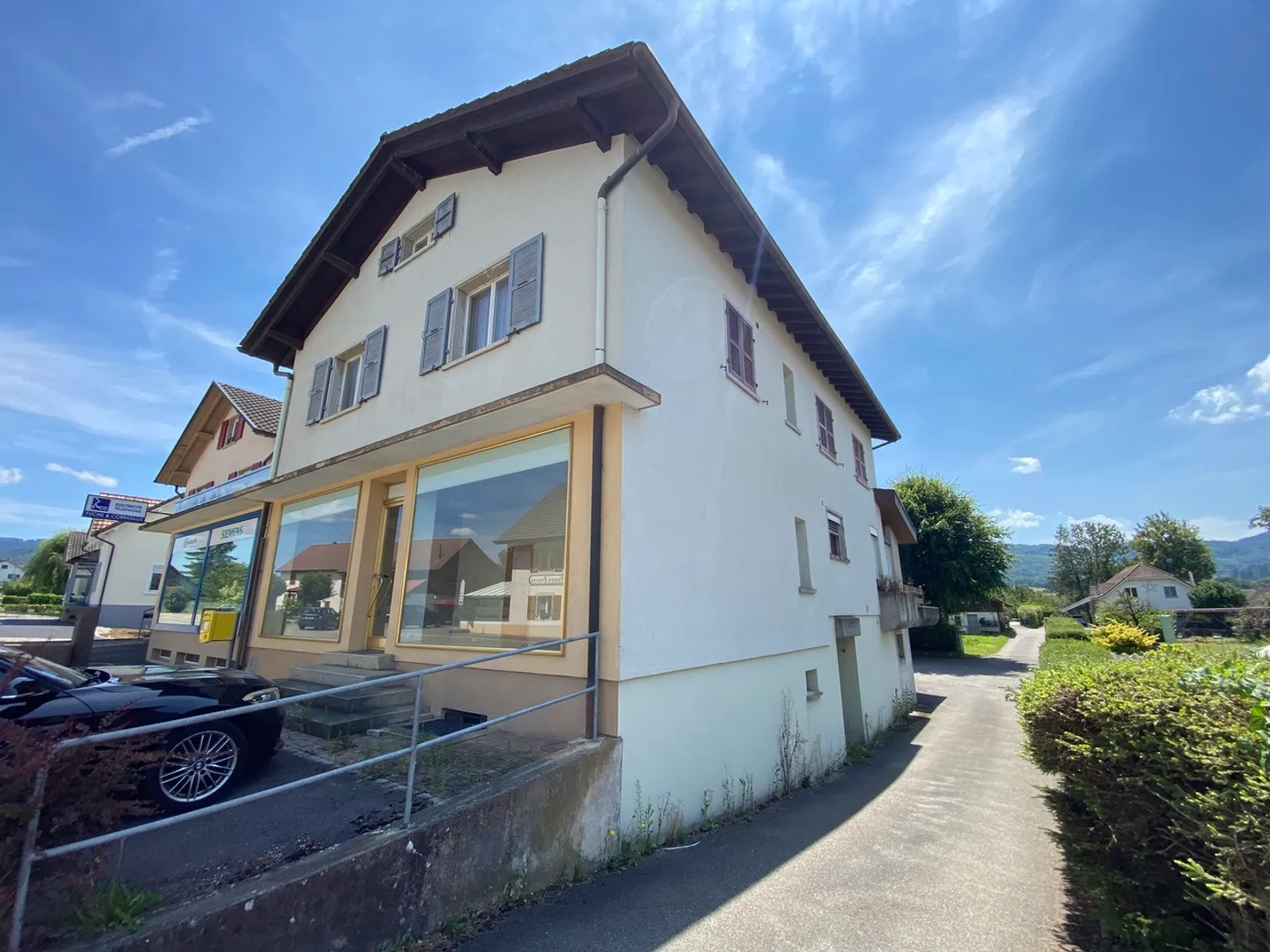 Gebäude mit 2 Wohnungen und einer Gewerbefläche - Foto 31 von 34