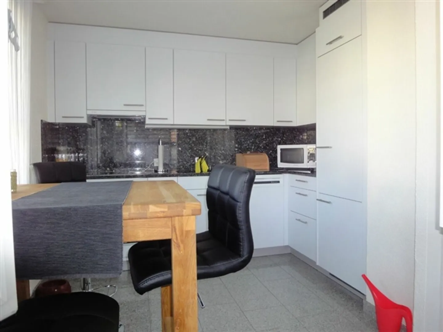 Appartement 2.5 pièces avec espace de jardin - Photo 4 sur 7