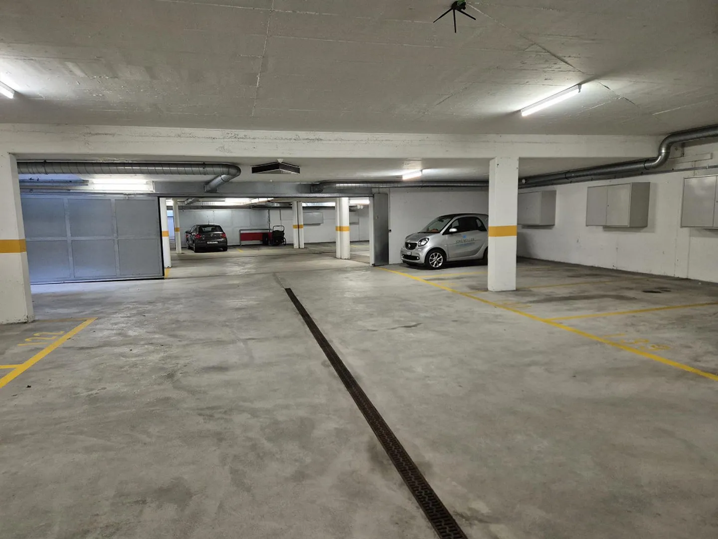 Underground parking spaces directly at Lenzburg train station - Photo 2 of 3