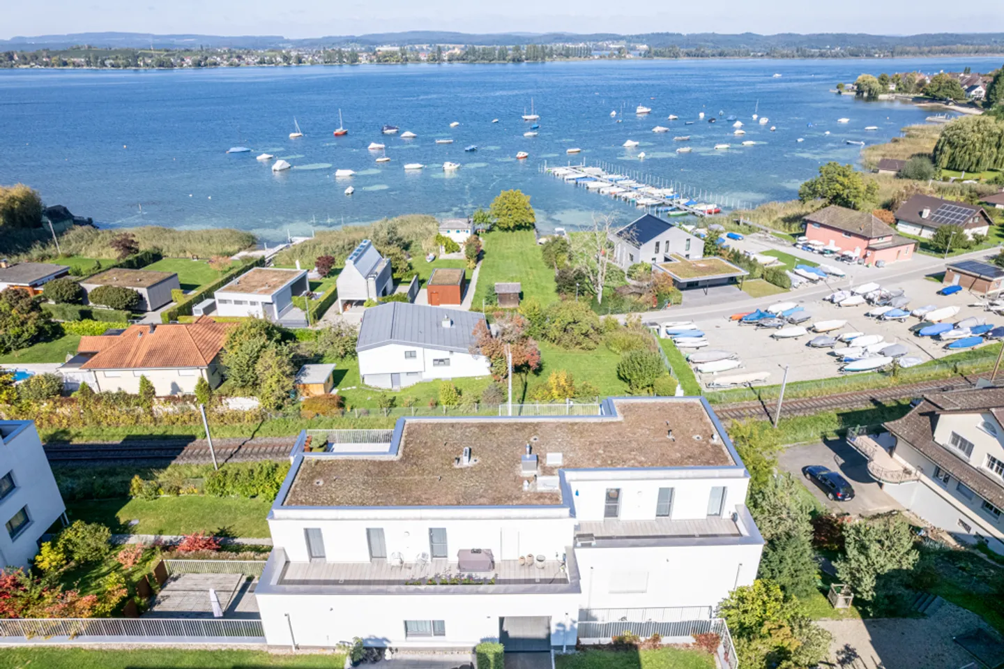Appartement penthouse exclusif avec vue imprenable sur le lac - Photo 15 sur 21