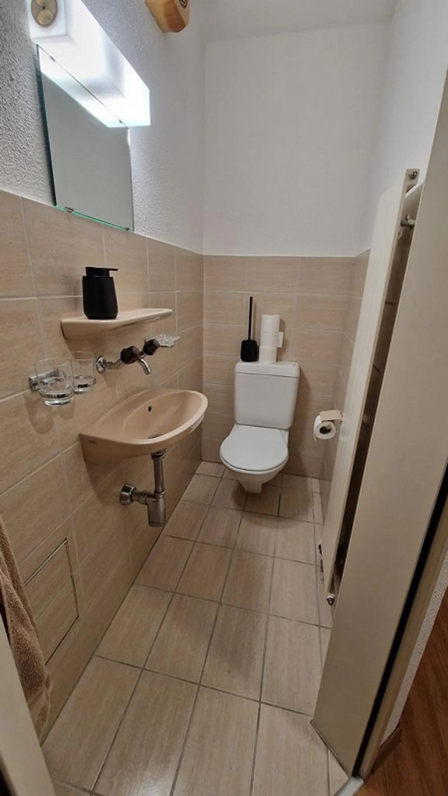 Appartement au rez-de-chaussée confortable ! - Photo 9 sur 12