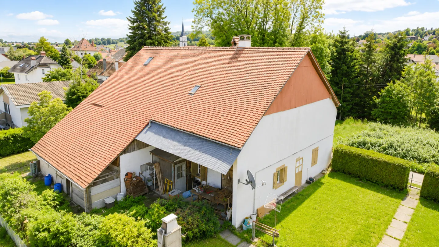 FARM WITH HIGH POTENTIAL IN THE HEART OF DOMDIDIER - Photo 2 of 3