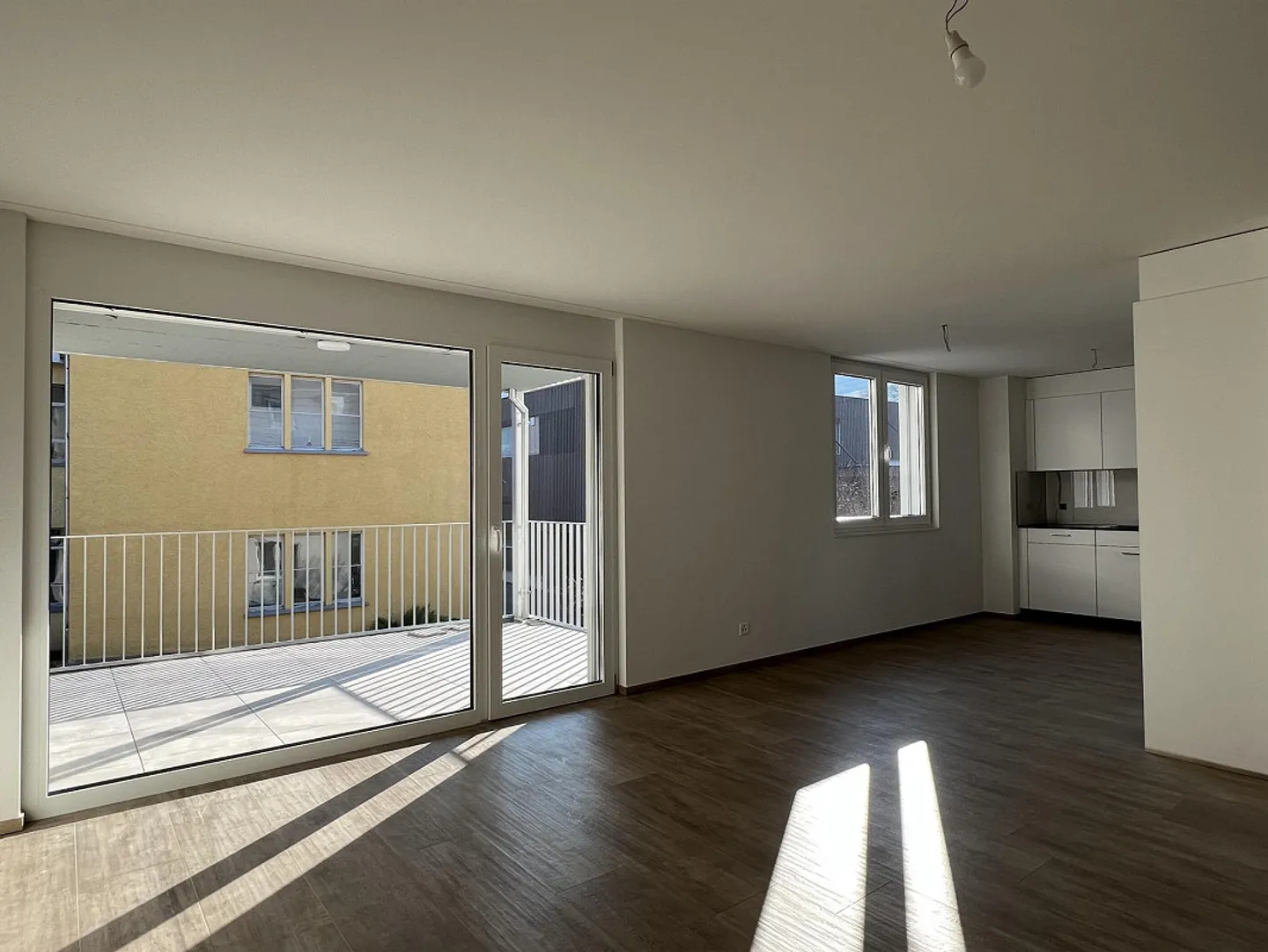 Appartement attrayant de 3,5 pièces avec patio au rez-de-chaussée à Tenniken - Photo 2 sur 8