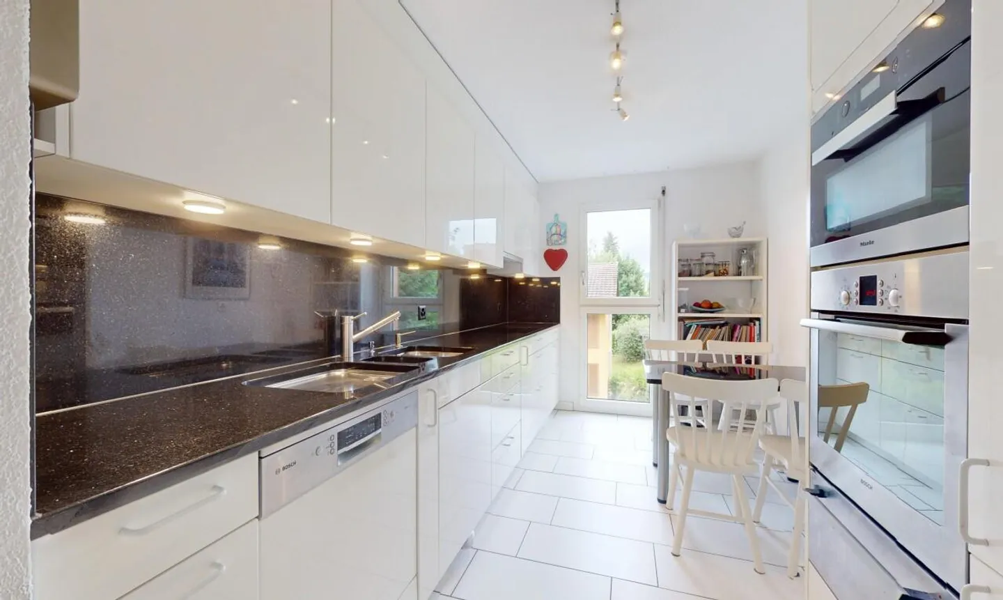 Appartamento duplex elegante con vista panoramica e terrazza solare - Foto 5 di 11