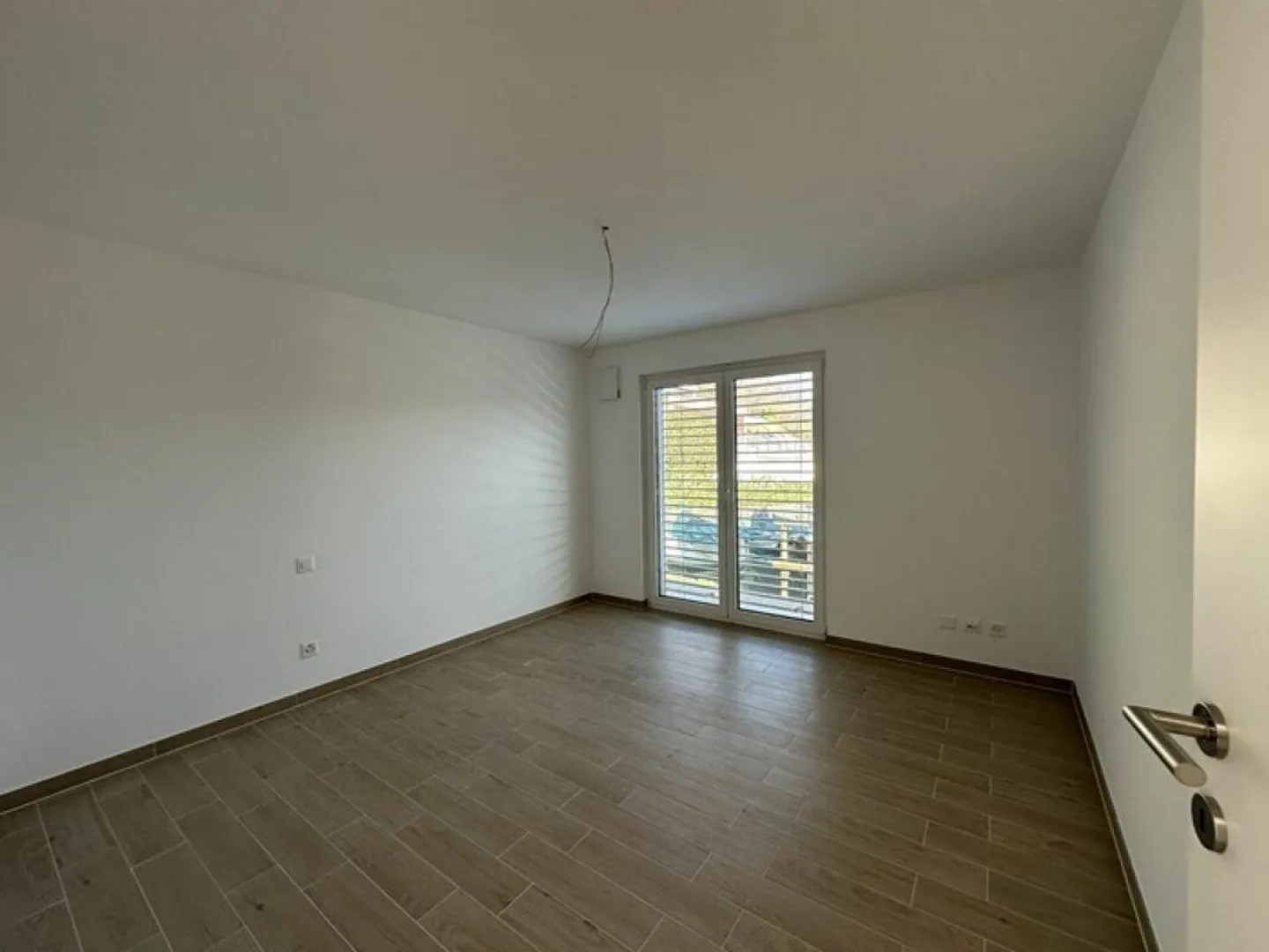 Modern and bright 3.5-room apartment with private garden - Photo 5 of 10
