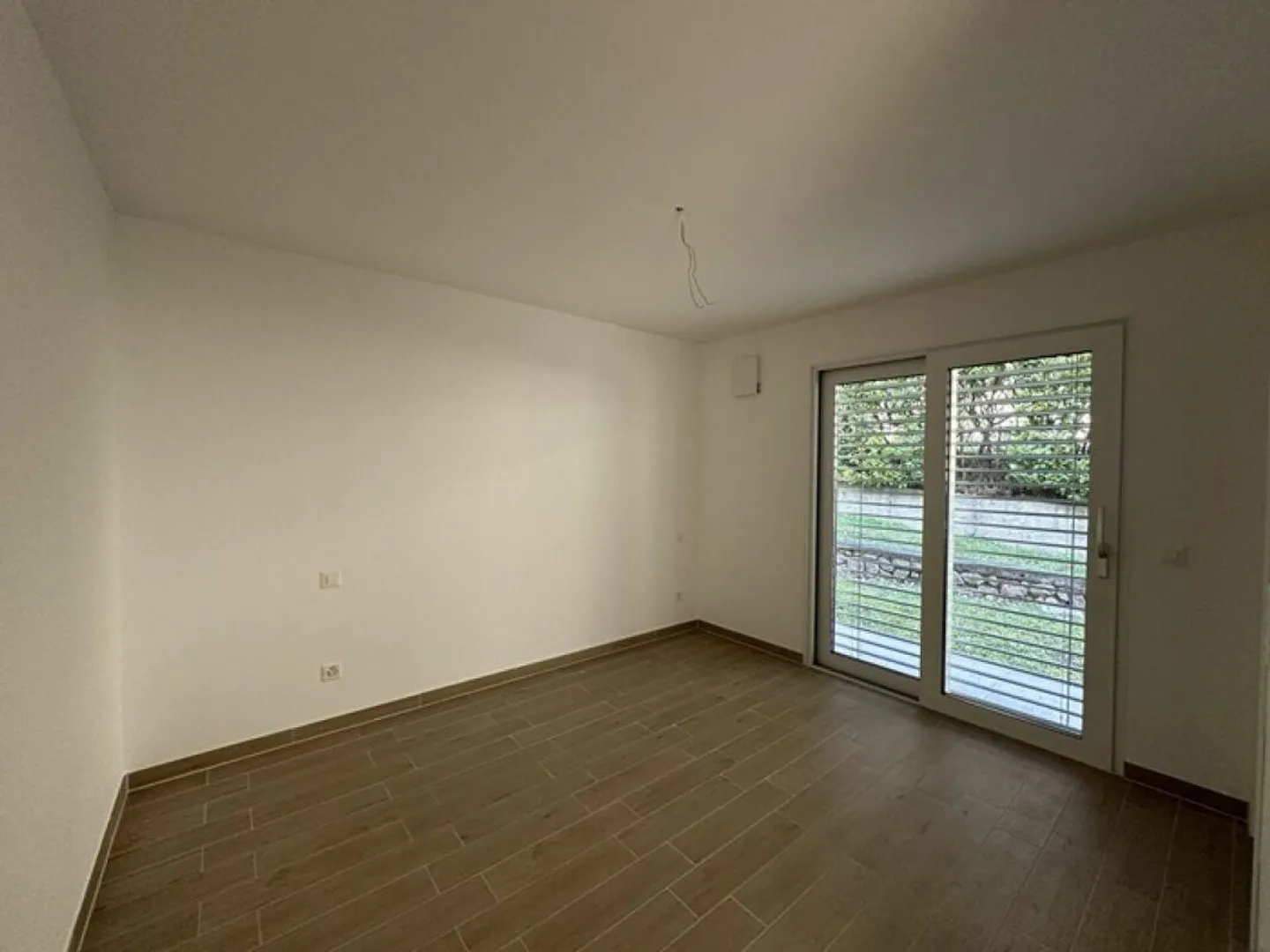 Modern and bright 3.5-room apartment with private garden - Photo 6 of 10