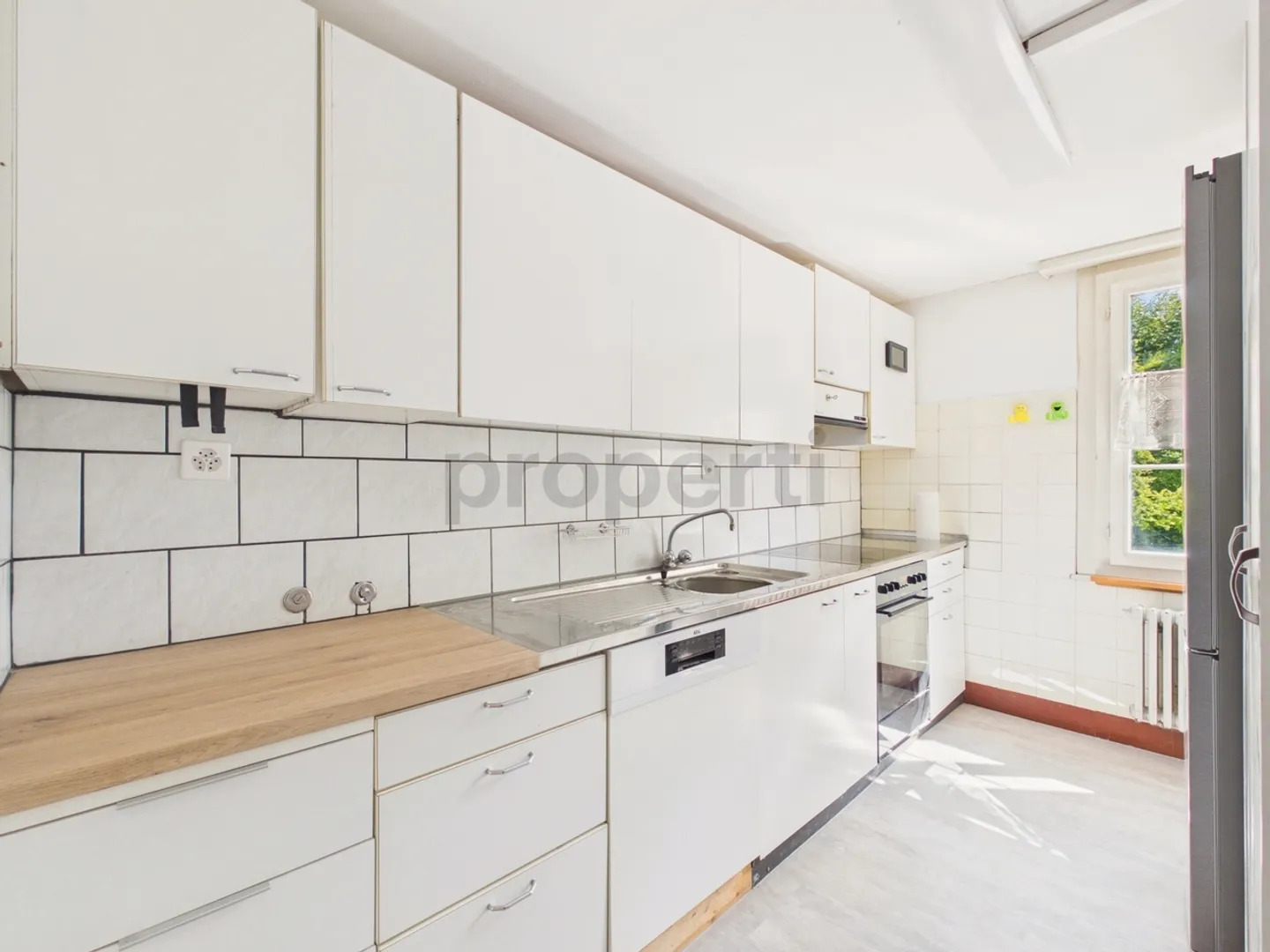 Renovated Apartment with Garden - Photo 2 of 13