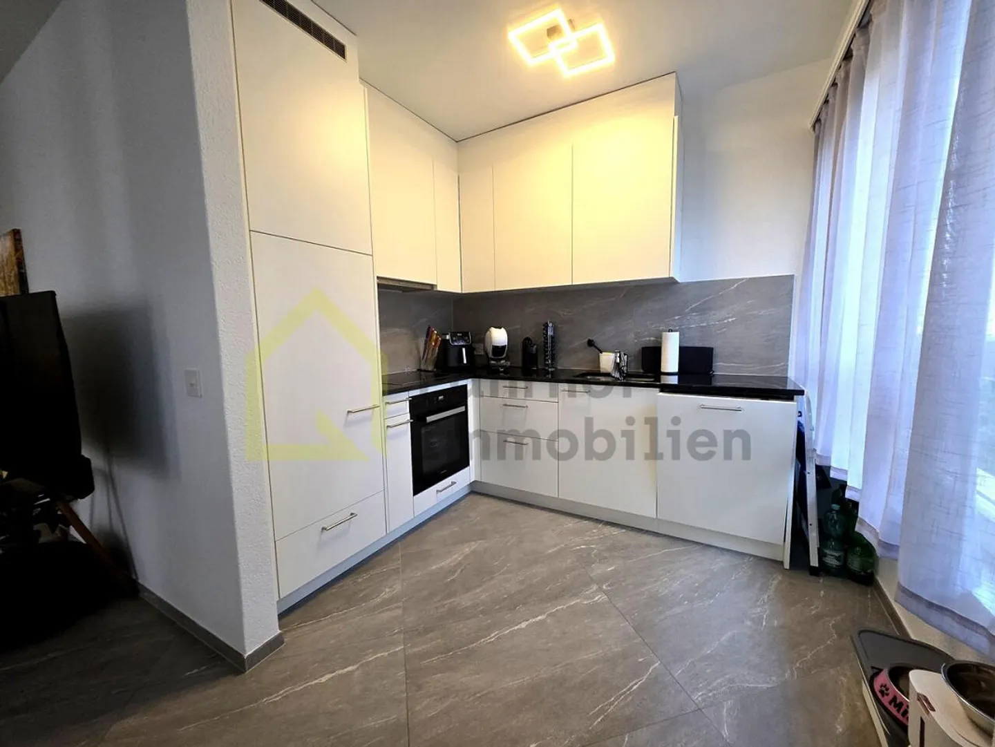 Appartement 2,5 pièces avec ascenseur et deux balcons au bord du lac Majeur - Photo 6 sur 15