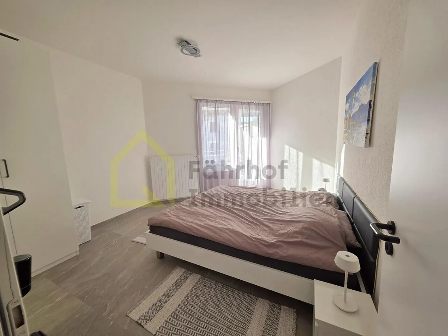 Appartement 2,5 pièces avec ascenseur et deux balcons au bord du lac Majeur - Photo 8 sur 15
