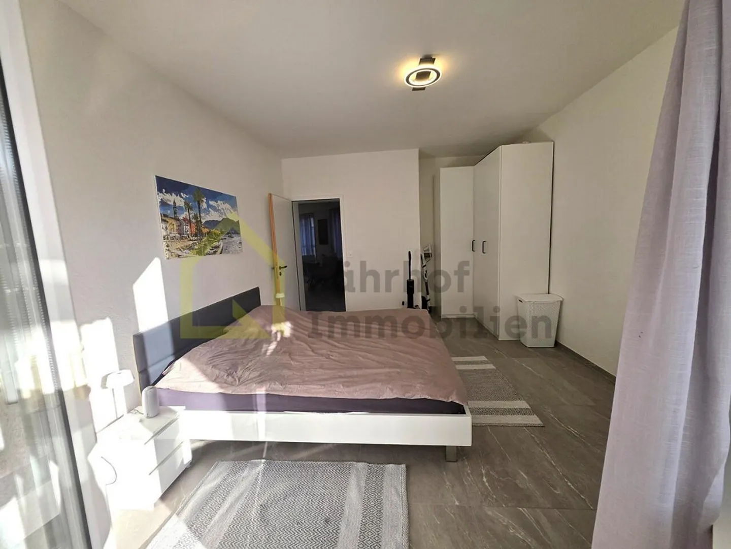 Appartement 2,5 pièces avec ascenseur et deux balcons au bord du lac Majeur - Photo 9 sur 15