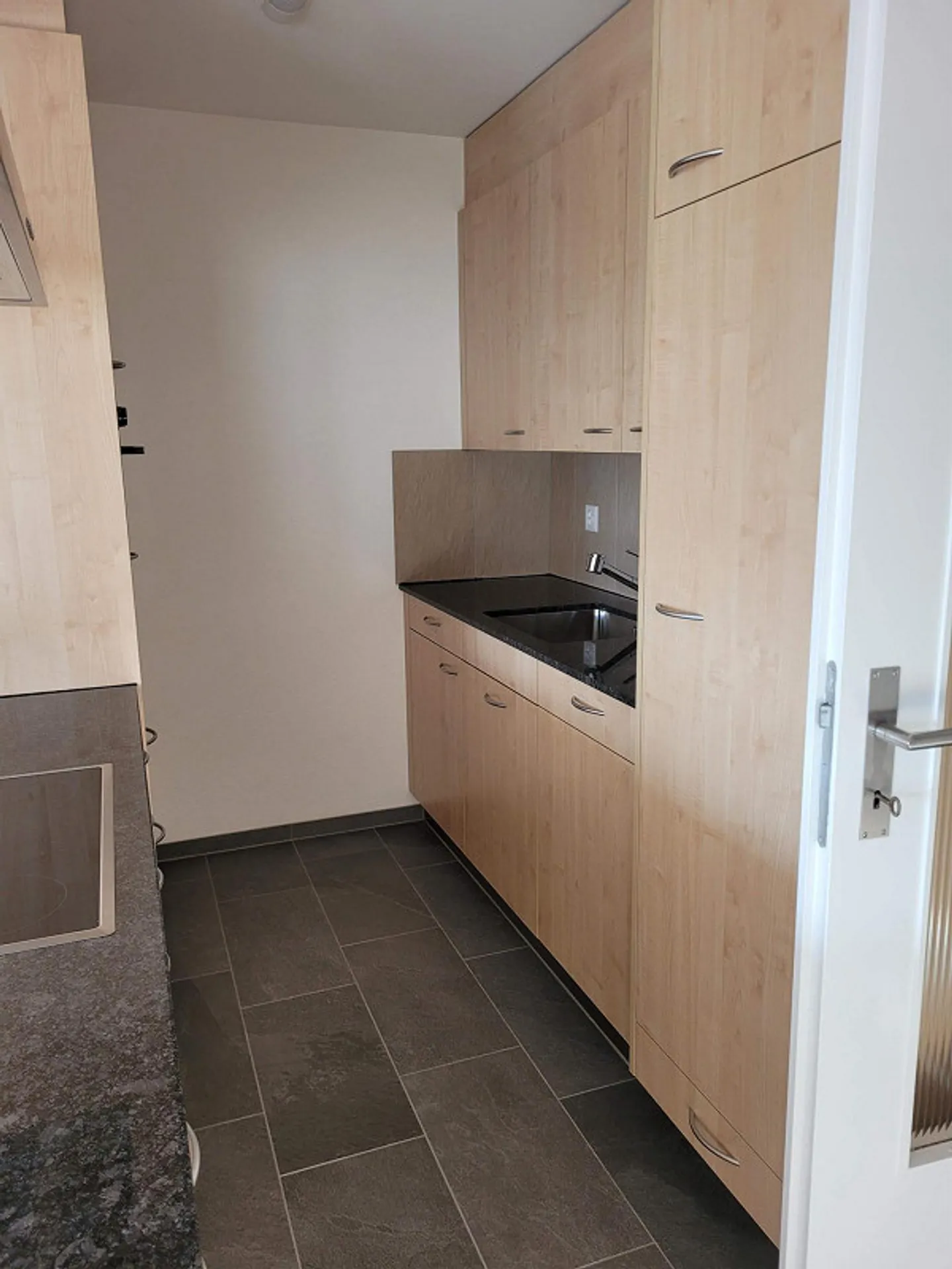 Appartamento 3.5 locali con balcone in un quartiere tranquillo - Foto 3 di 8