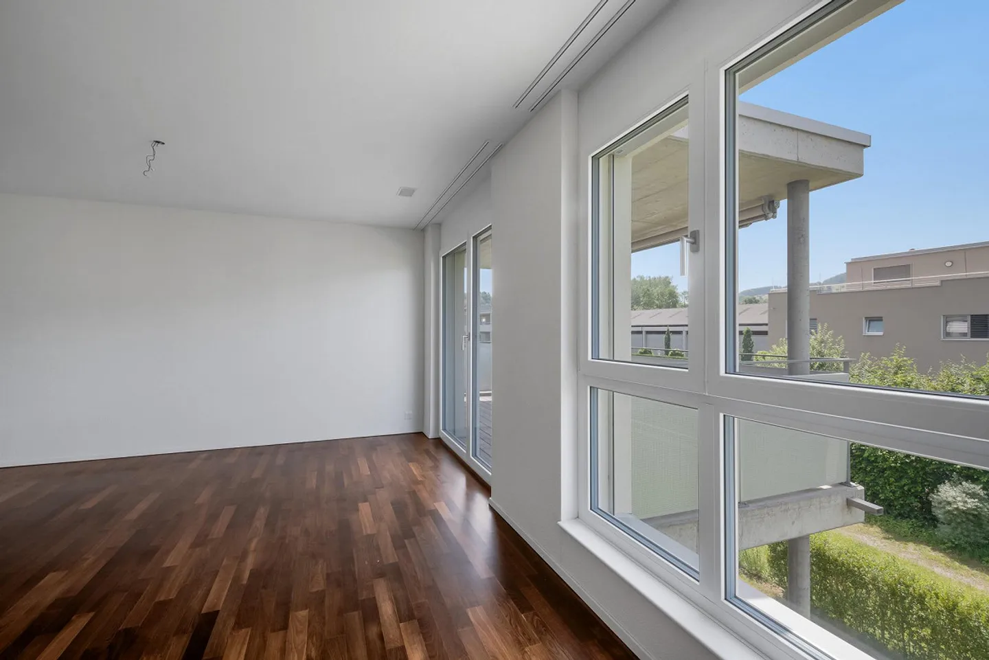 Appartement moderne dans un environnement verdoyant - Photo 5 sur 13