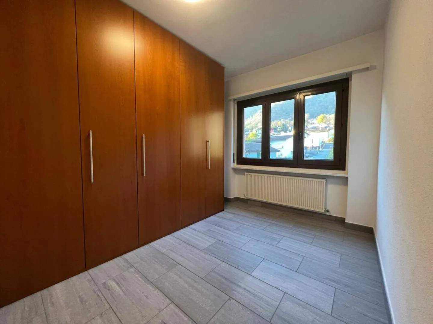 Appartement 4.5 pièces - Lumino - Photo 8 sur 10