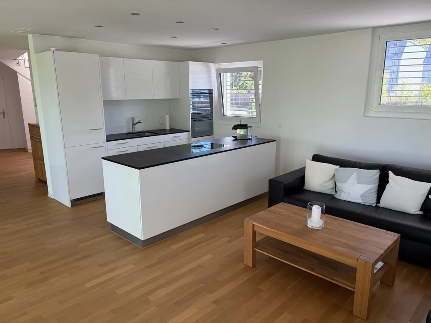 Appartement en duplex de 5,5 pièces baigné de lumière - Photo 3 sur 12