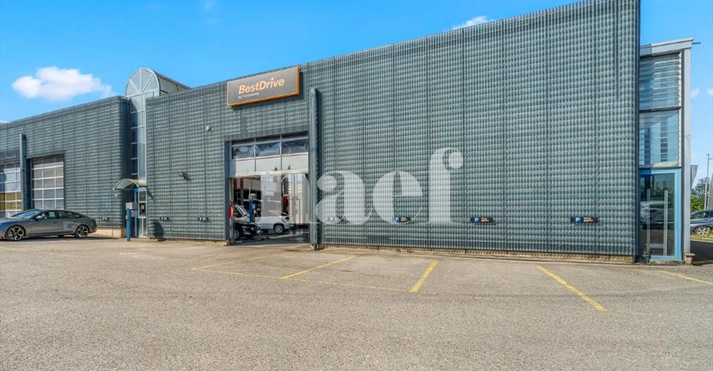 Garage with reception, workshop and storage spaces for sale in Givisiez - Photo 1 of 11