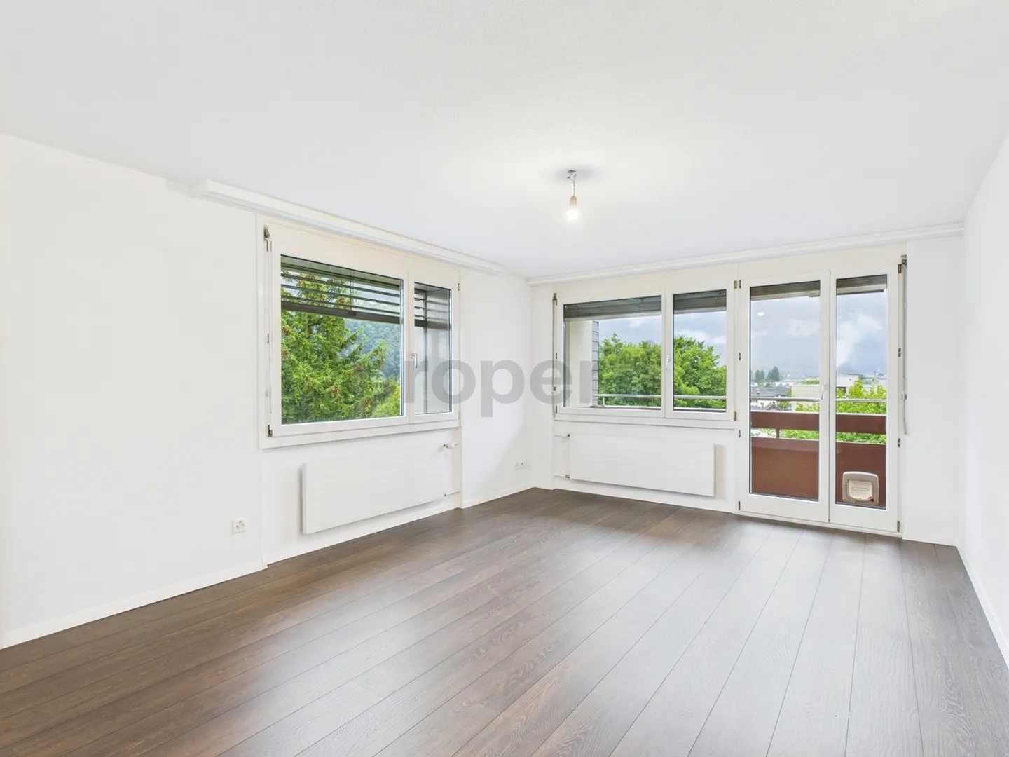 Cozy 3.5-room apartment with balcony and panoramic view in Näfels - Photo 1 of 11