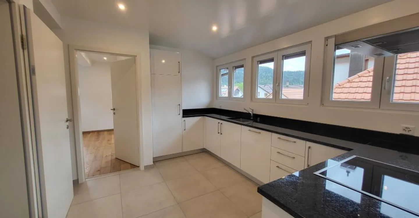 Charmant appartement 2,5 pièces - Photo 2 sur 8