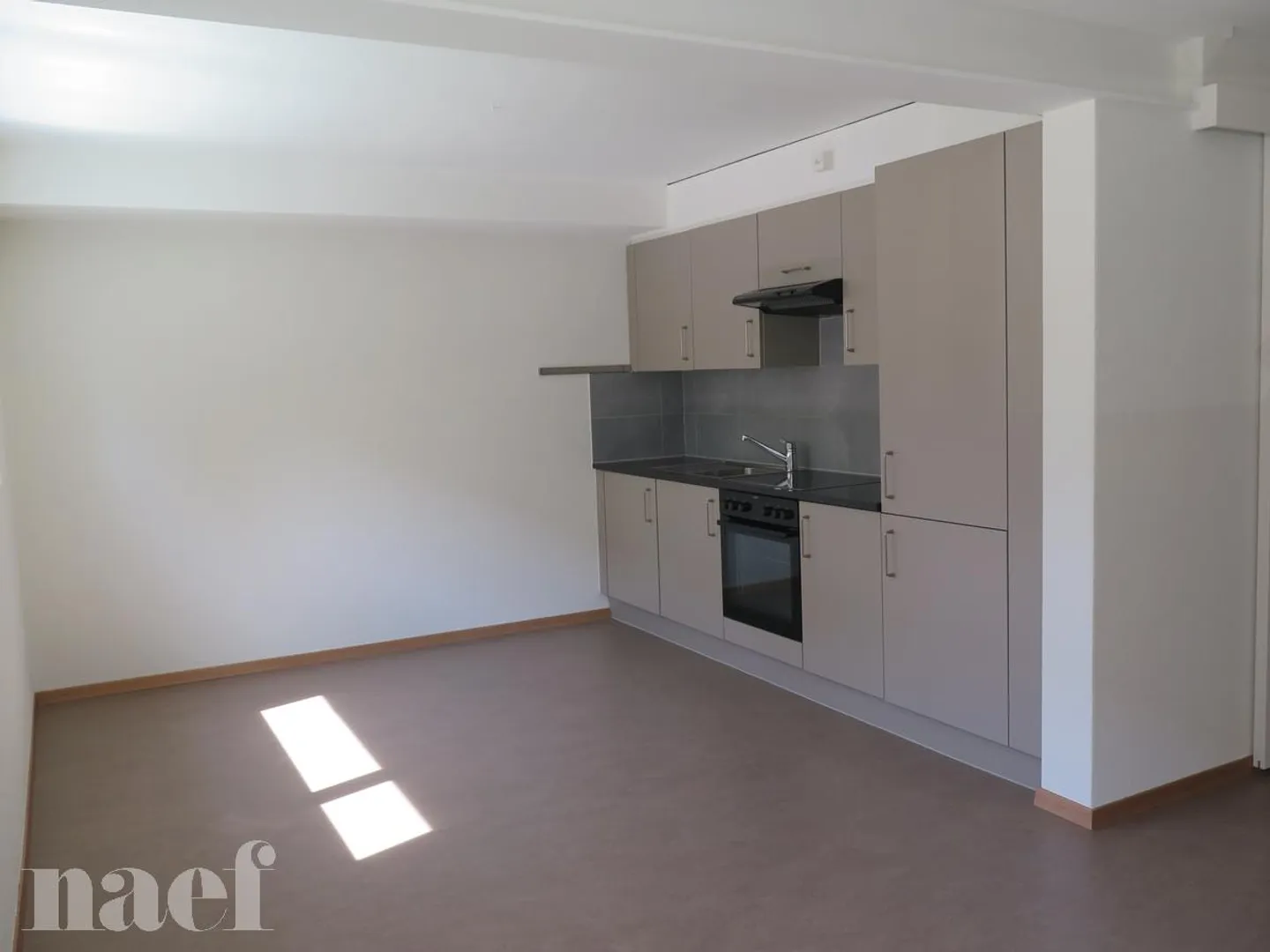 Appartement dans un bâtiment accessible - Photo 2 sur 6