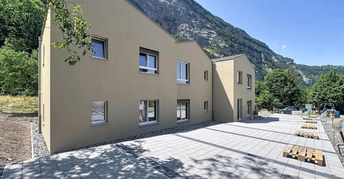 Appartement neuf 5.5 pièces avec jardin - Photo 1 sur 13