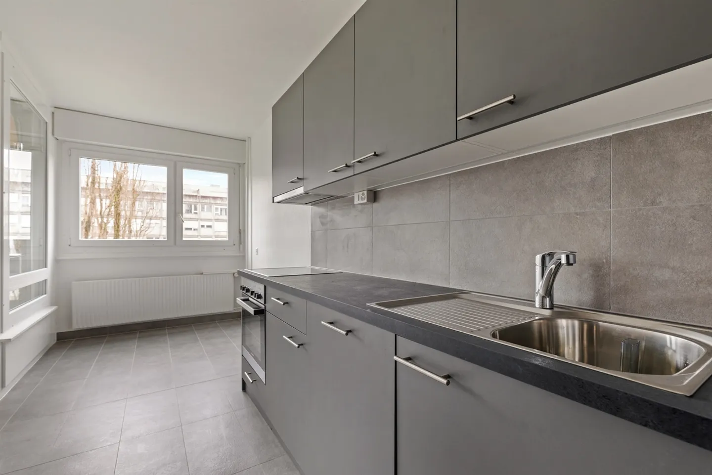 Vivere in famiglia in un quartiere tranquillo di Meyrin! - Foto 6 di 12