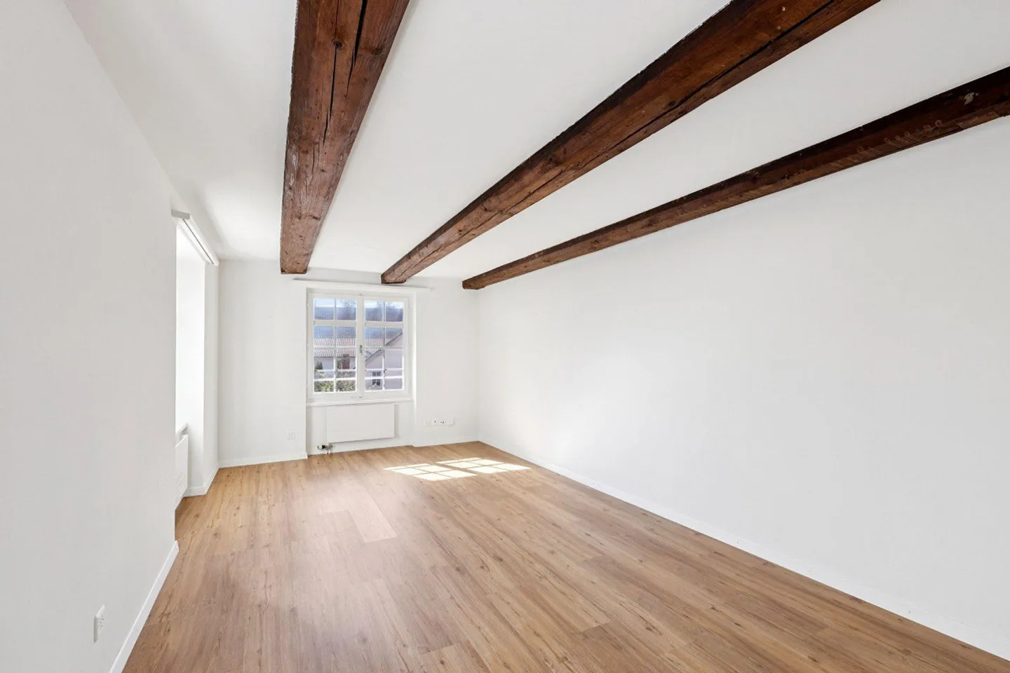 Vivere nel centro del villaggio: appartamento di 2,5 stanze con balcone per rilassarsi - Foto 1 di 9