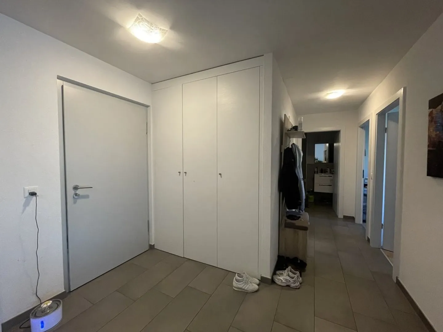 Appartement de 3,5 pièces au rez-de-chaussée avec terrasse - Photo 2 sur 10