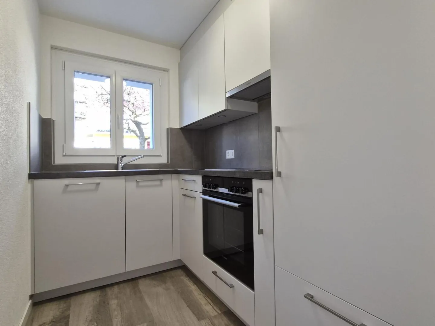 Apartment with 3.5 rooms on the ground floor - Photo 2 of 13