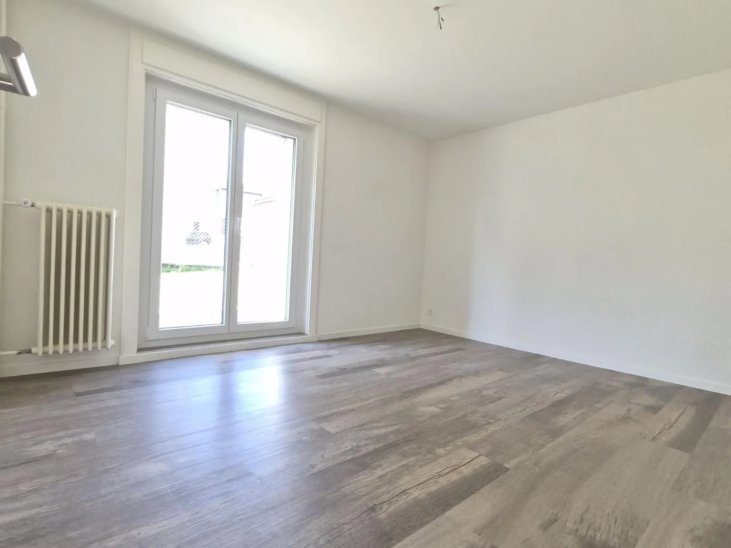 Apartment with 3.5 rooms on the ground floor - Photo 6 of 13