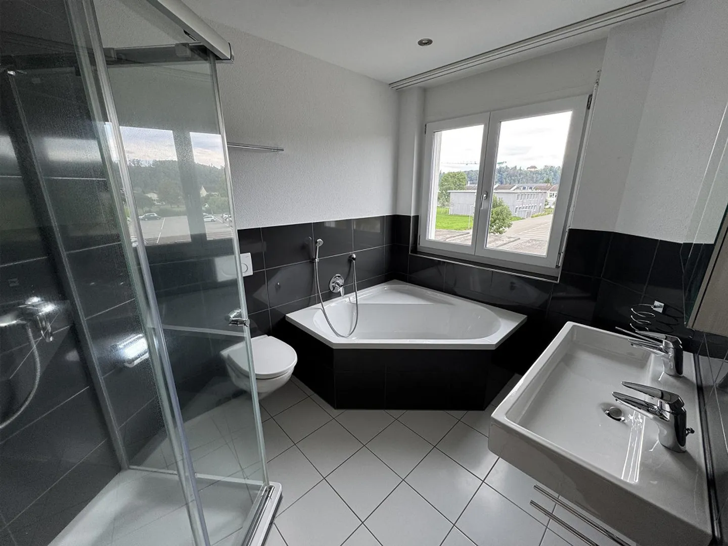 Appartement pratique de 4,5 pièces - Photo 9 sur 10