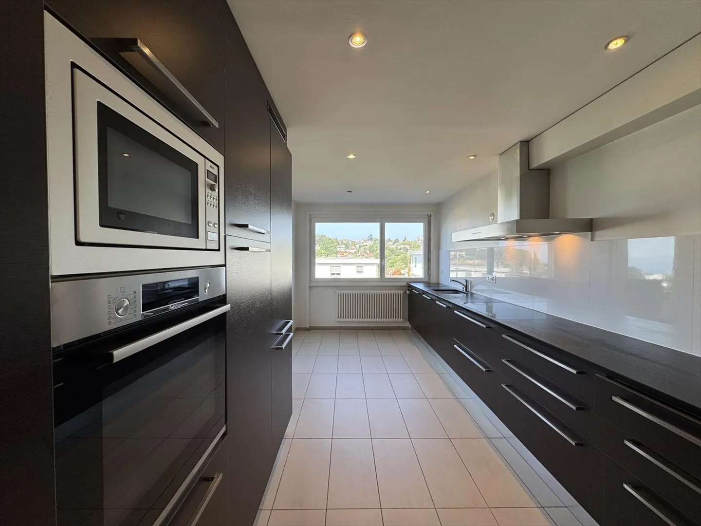 Elegant 4.5 rooms with terrace and exceptional lake view - Photo 6 of 13