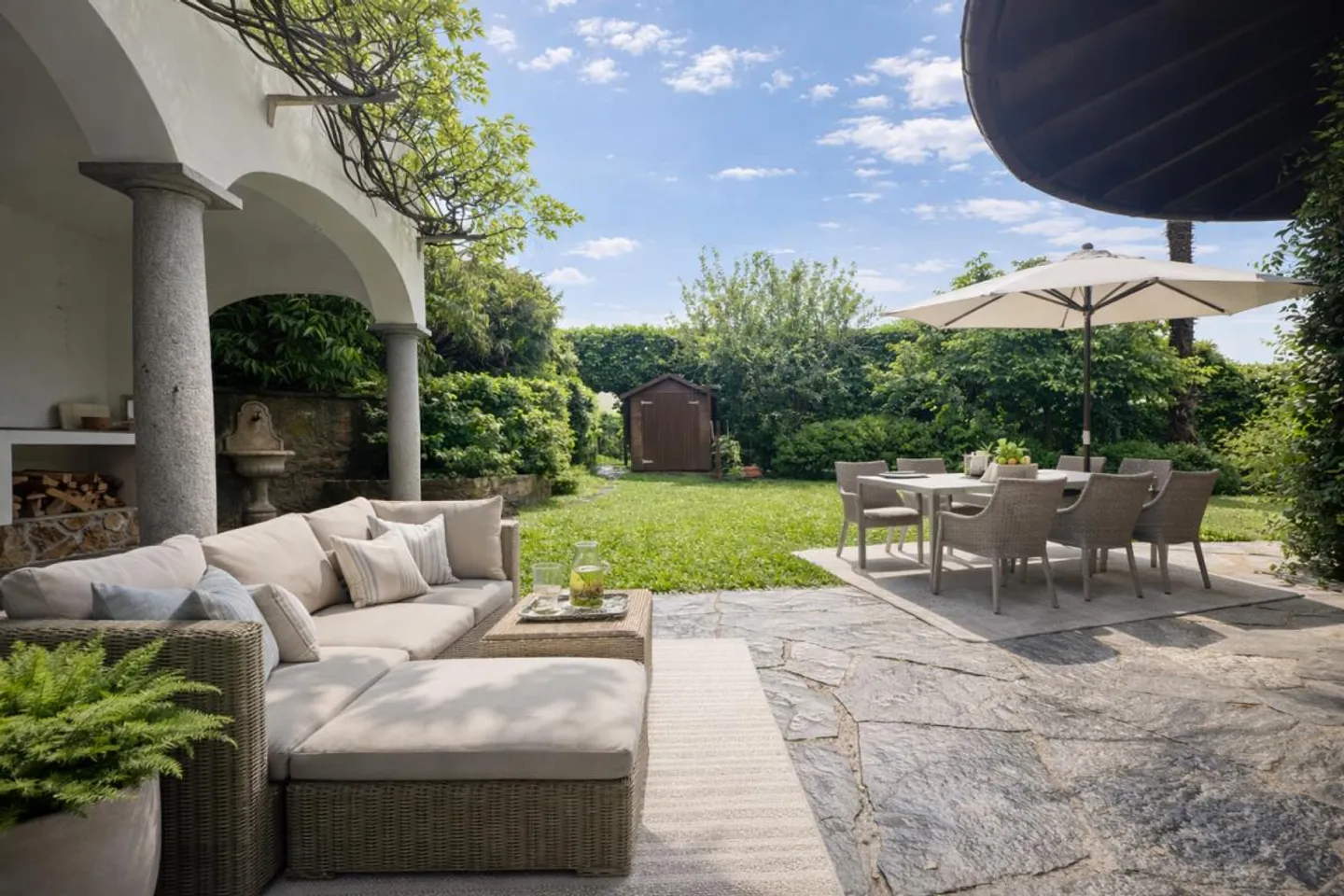 COMANO · ELEGANT APARTMENT WITH SPACIOUS LIVING AREA · PRIVATE GARDEN AND POOL - Photo 1 of 14