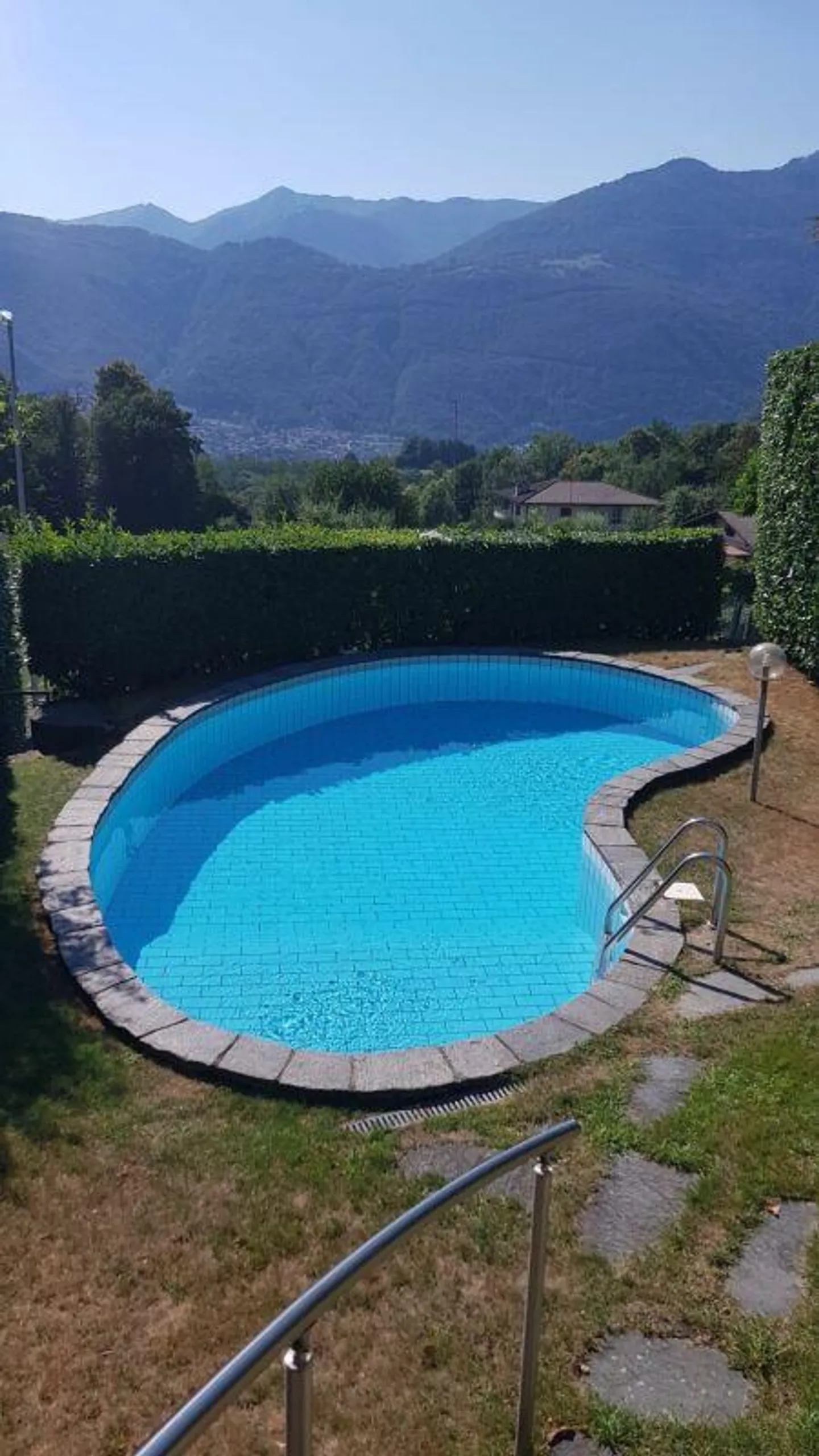 COMANO · ELEGANT APARTMENT WITH SPACIOUS LIVING AREA · PRIVATE GARDEN AND POOL - Photo 14 of 14