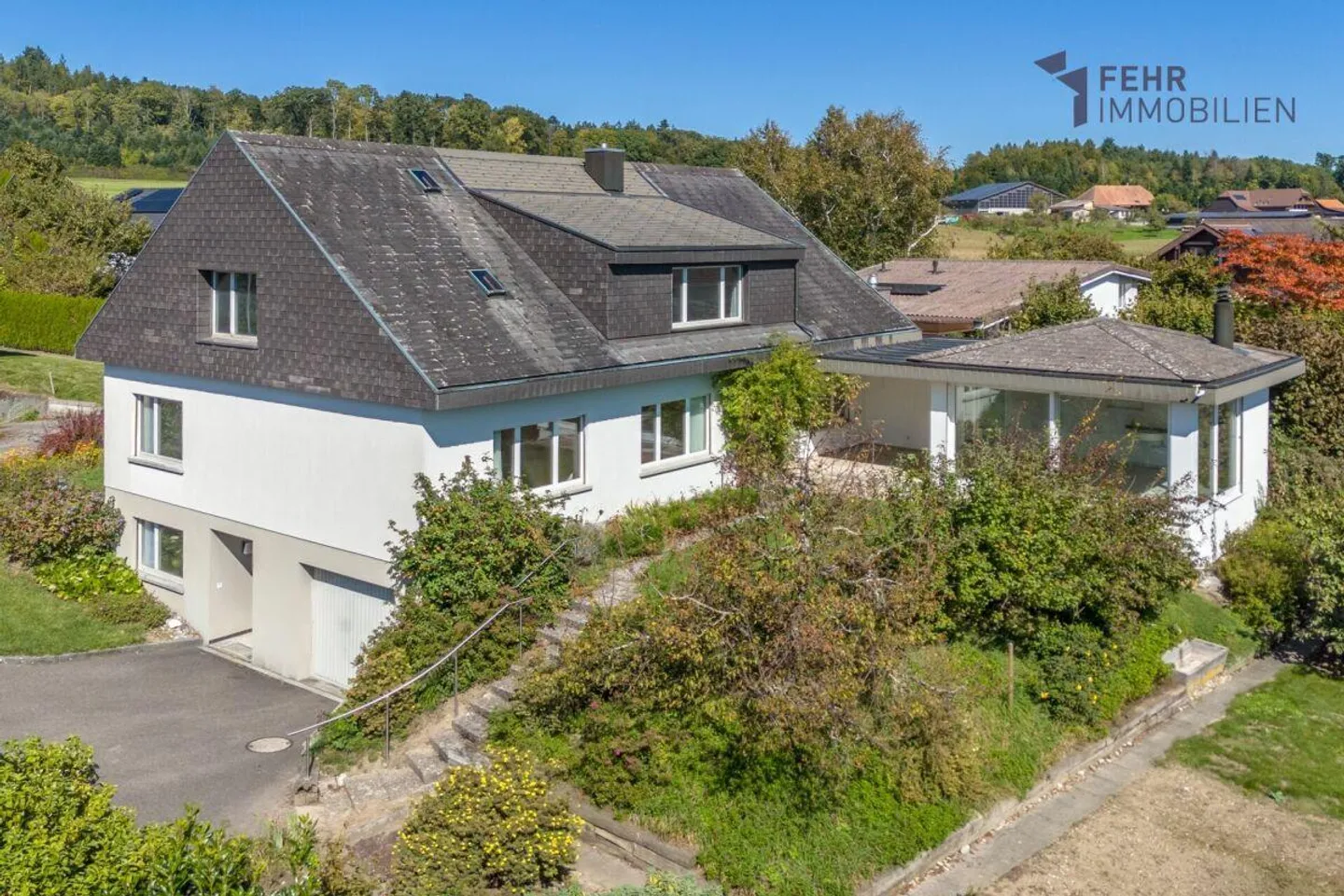 Fehr Immobilien - Freistehendes Zwei-Generationen-Haus - Foto 1 von 13