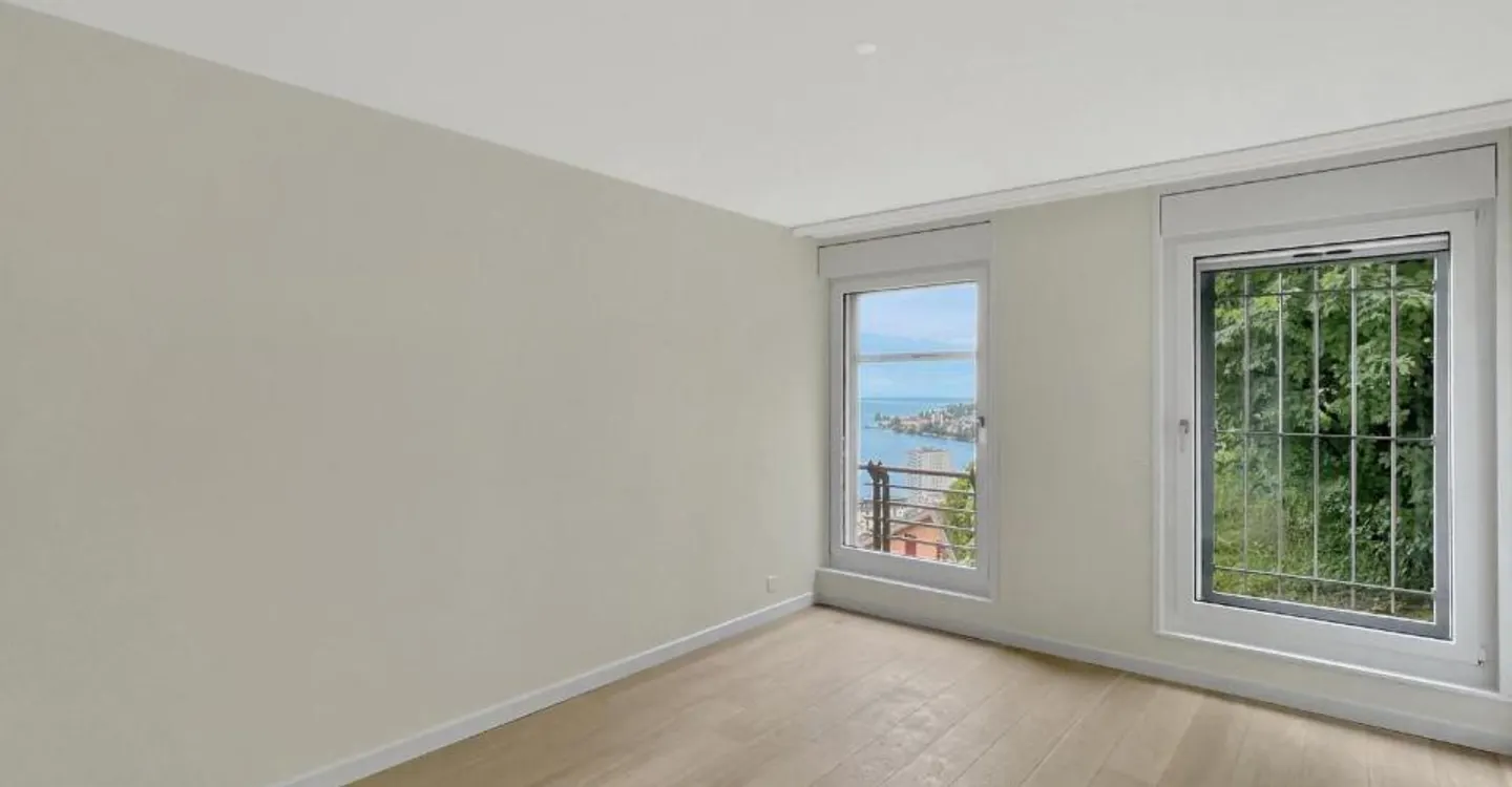 Appartement Contemporain avec Vue sur le Lac - Photo 6 sur 12