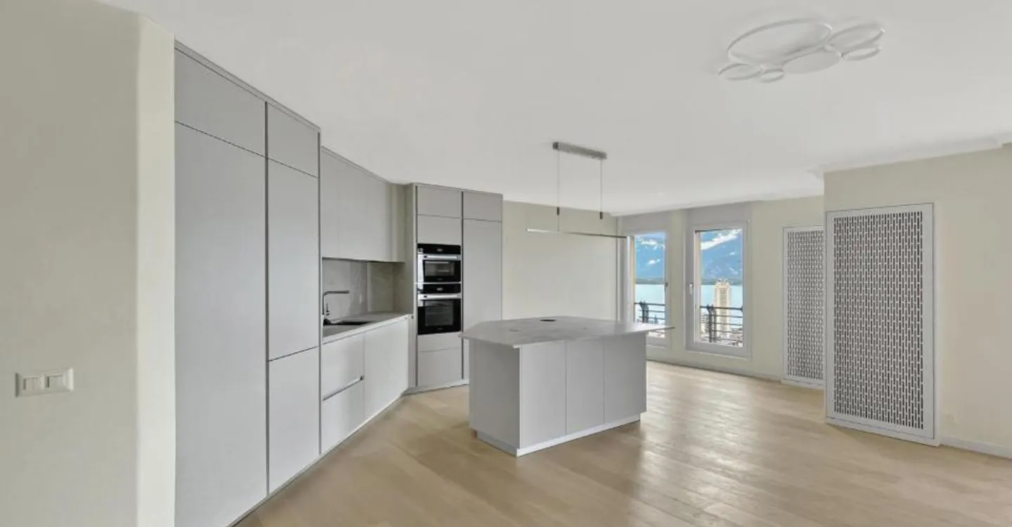 Appartement Contemporain avec Vue sur le Lac - Photo 4 sur 12