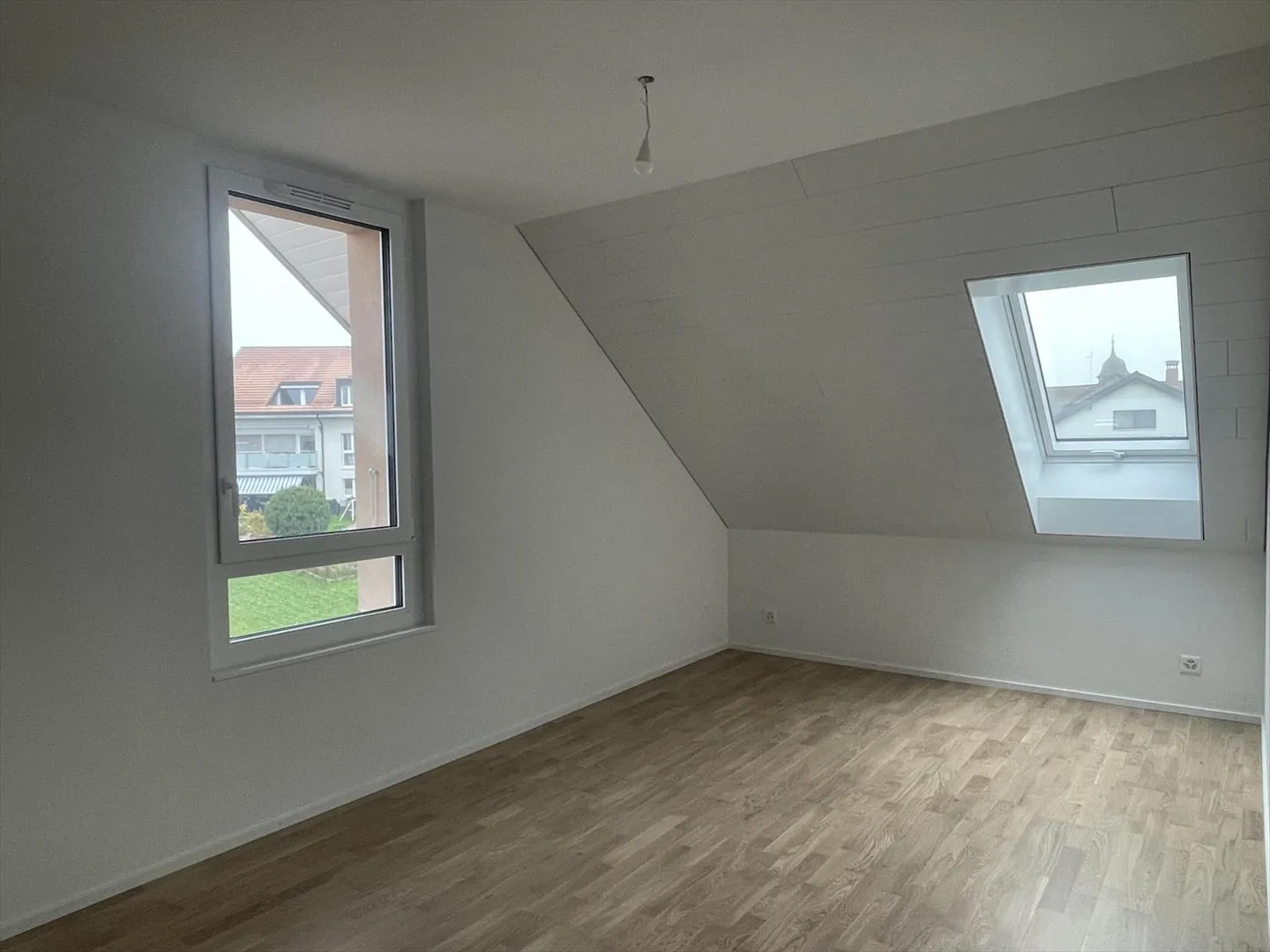 A Champagne – Last Apartment FOR Sale in a New Development – 3.5 Rooms with Balcony and Underground Garage - Photo 5 of 13