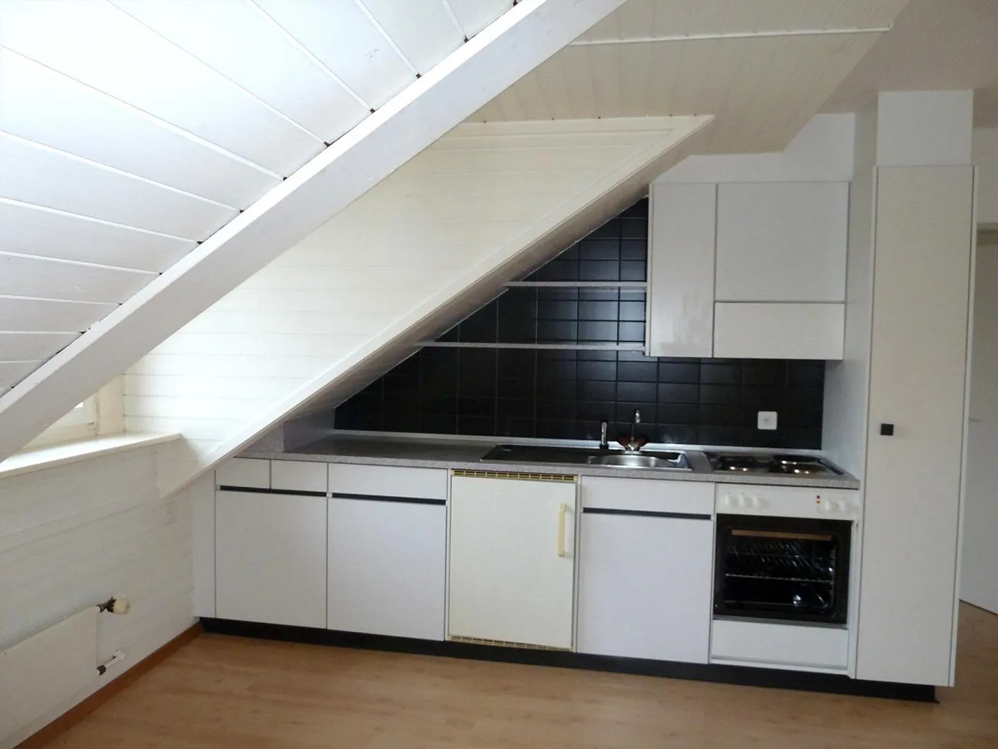 Charmante Dachwohnung - Foto 2 von 5