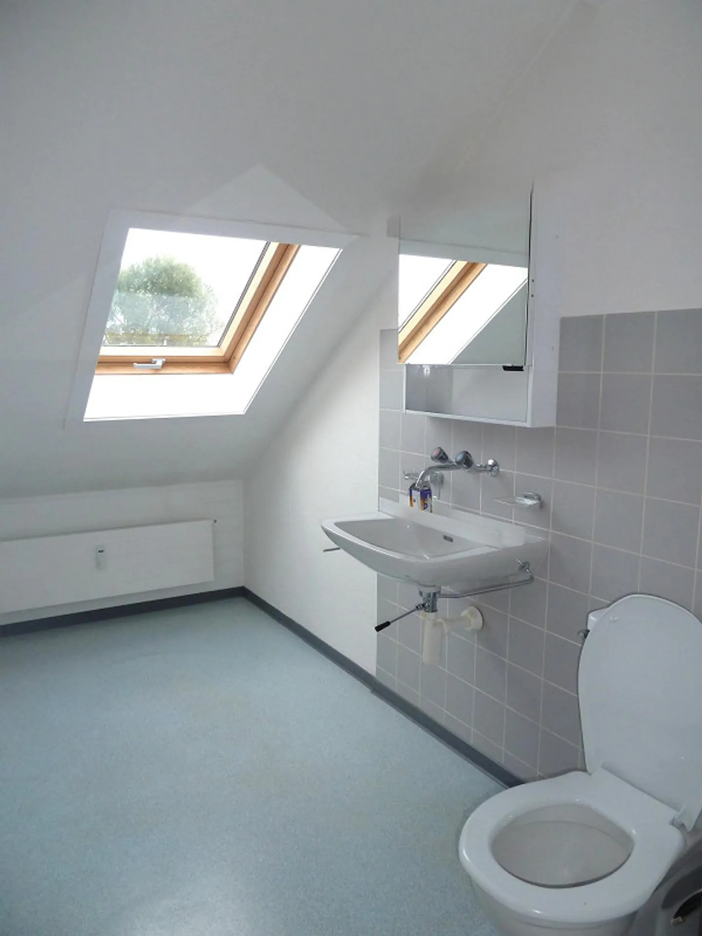 Charmante Dachwohnung - Foto 3 von 5