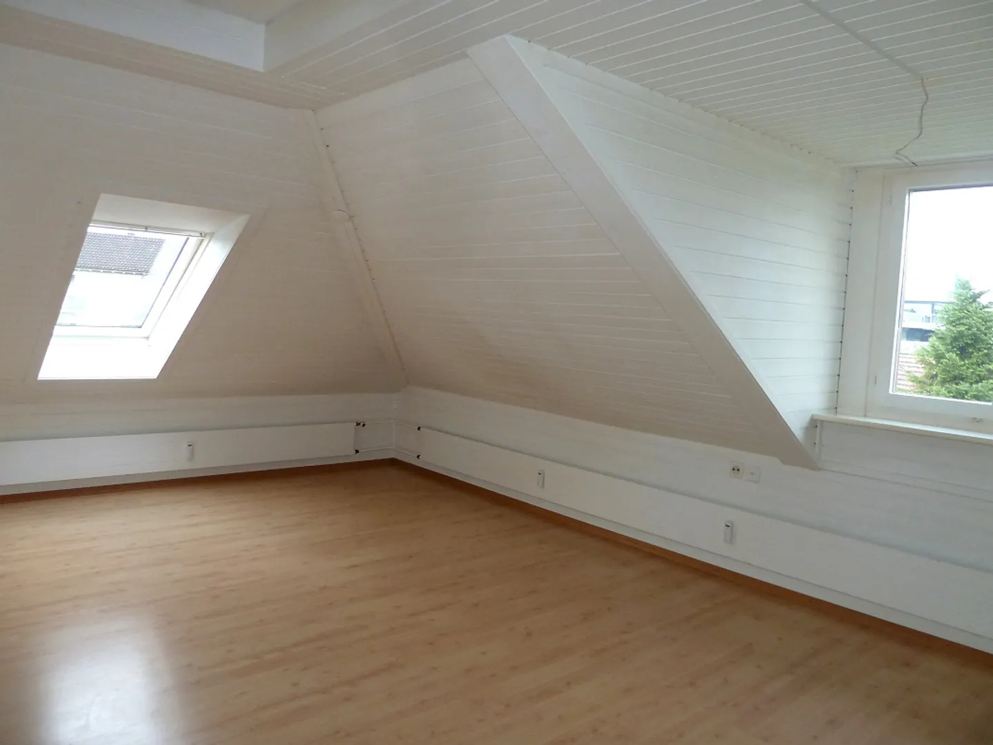 Charmante Dachwohnung - Foto 4 von 5