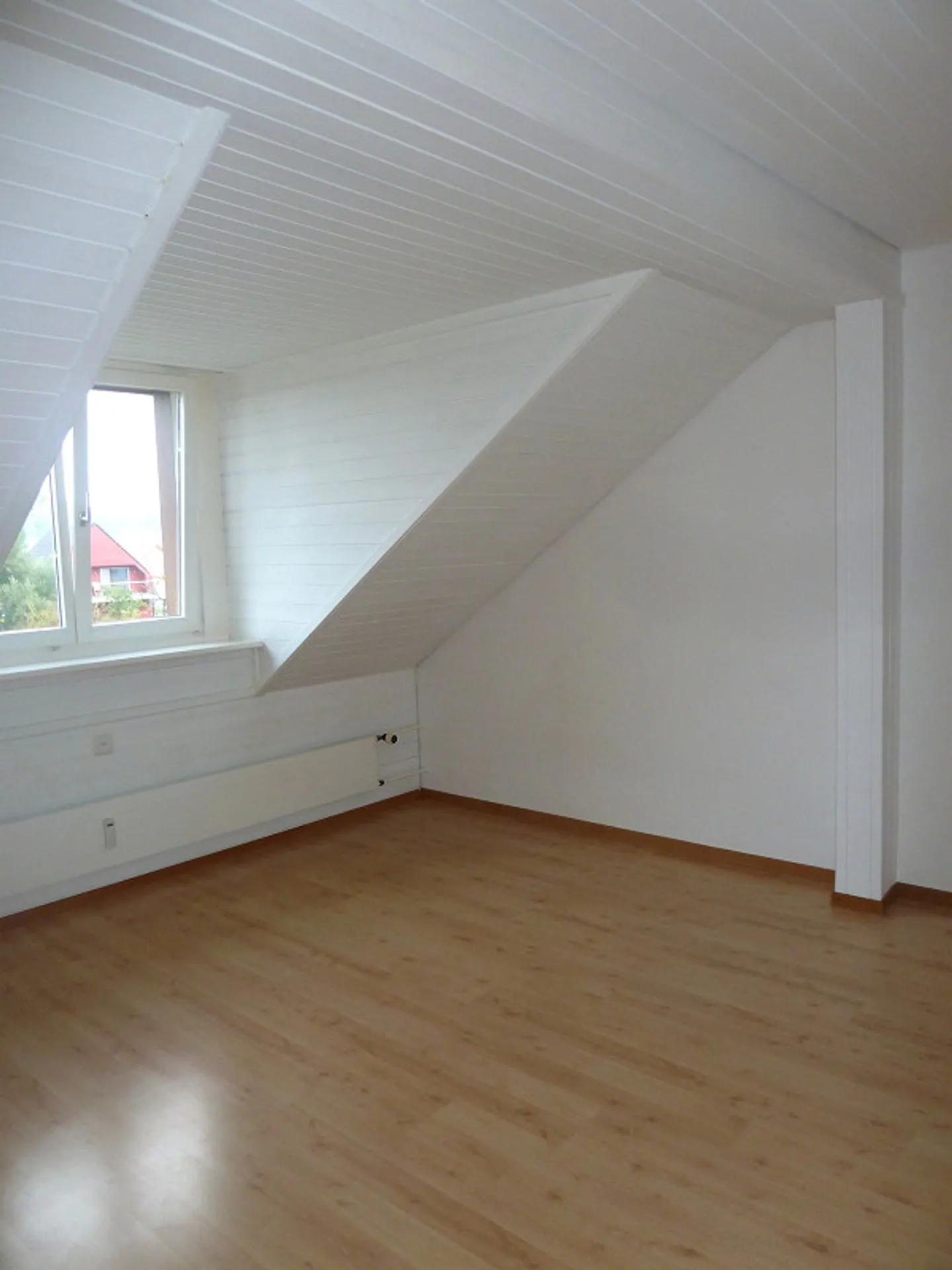 Charmante Dachwohnung - Foto 5 von 5