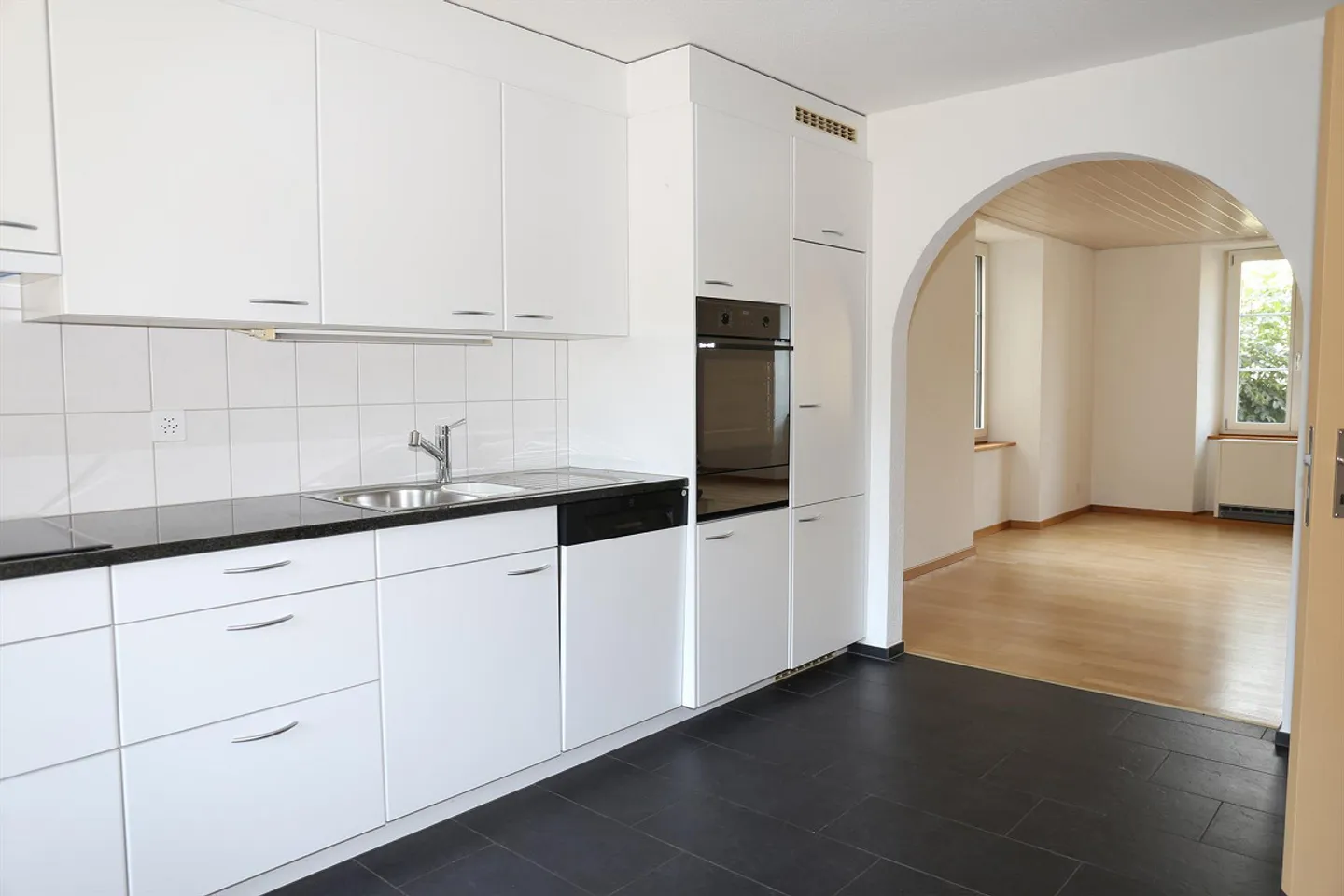 Cozy Living in a Two-Family House - Photo 4 of 11