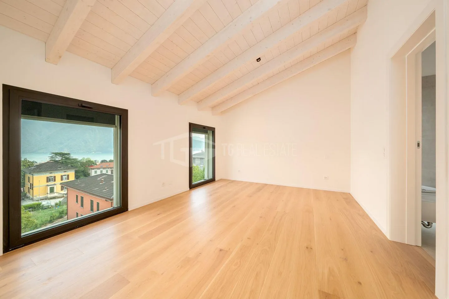 NEUE DACHGESCHOSSWOHNUNG MIT SEEBLICK - Foto 6 von 11