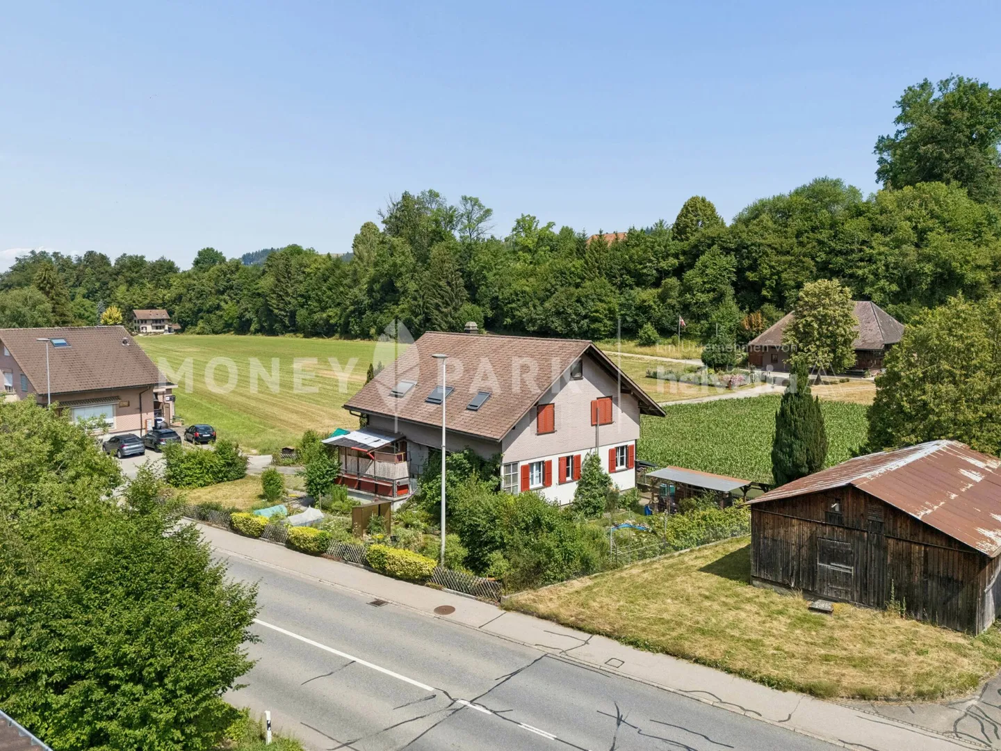 Detached and well-maintained property with two residential units - Photo 1 of 8