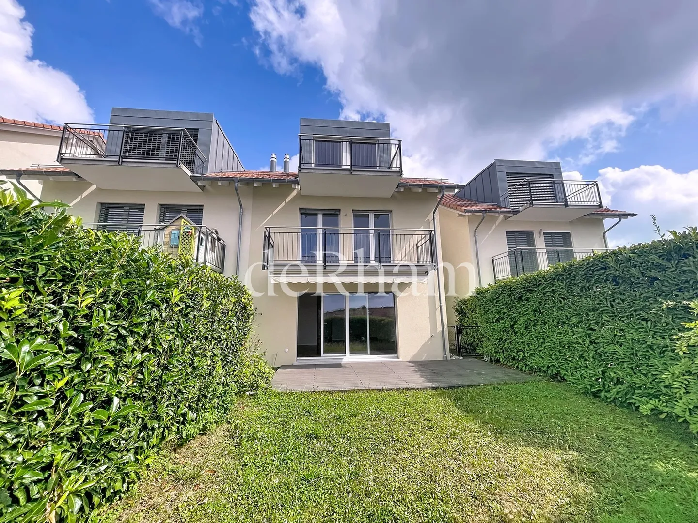 Reihenhaus-Villa mit 5,5 Zimmern und Garten - Foto 1 von 10